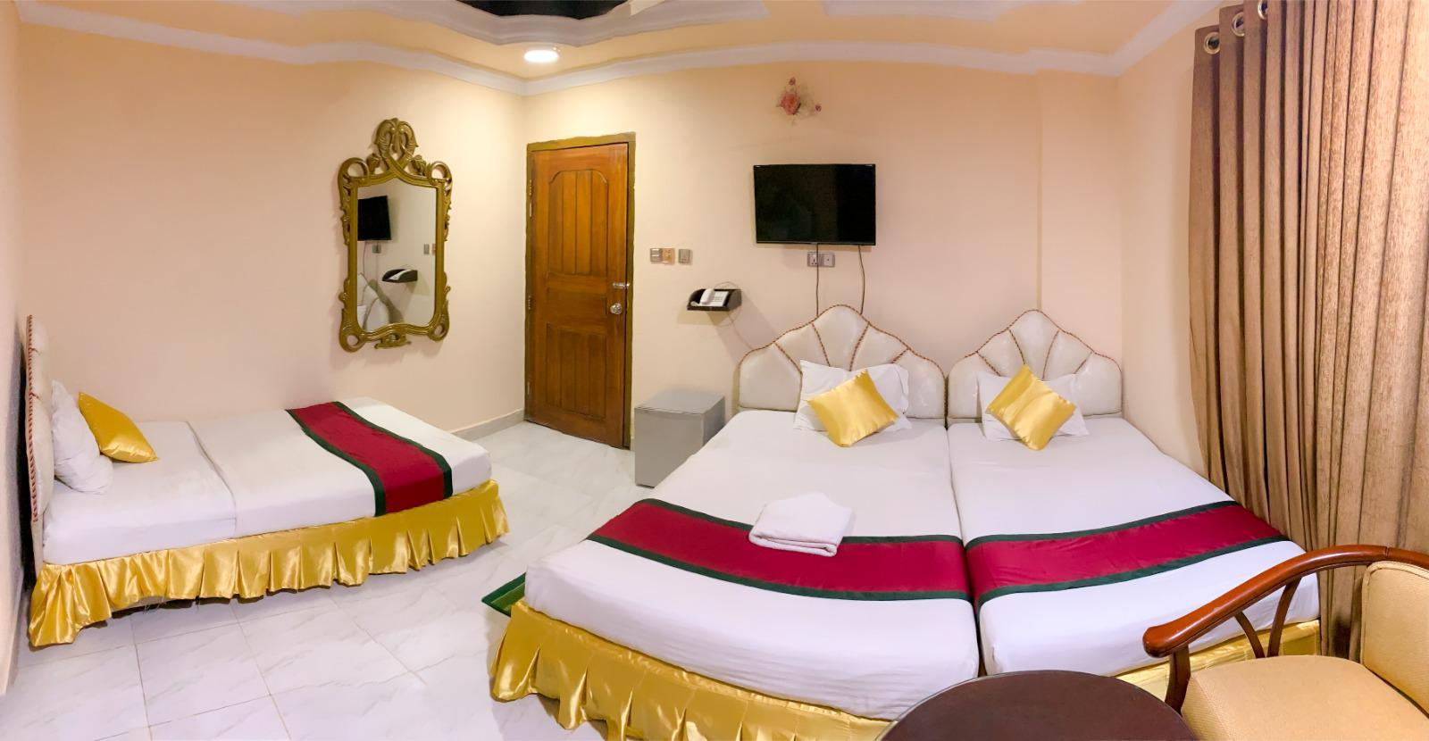 Spacious Triple-Bed Room at Reyadha International, Cox’s Bazar Triple-bed room with modern decor at Reyadha International Hotel near Sugandha Point, Cox’s Bazar