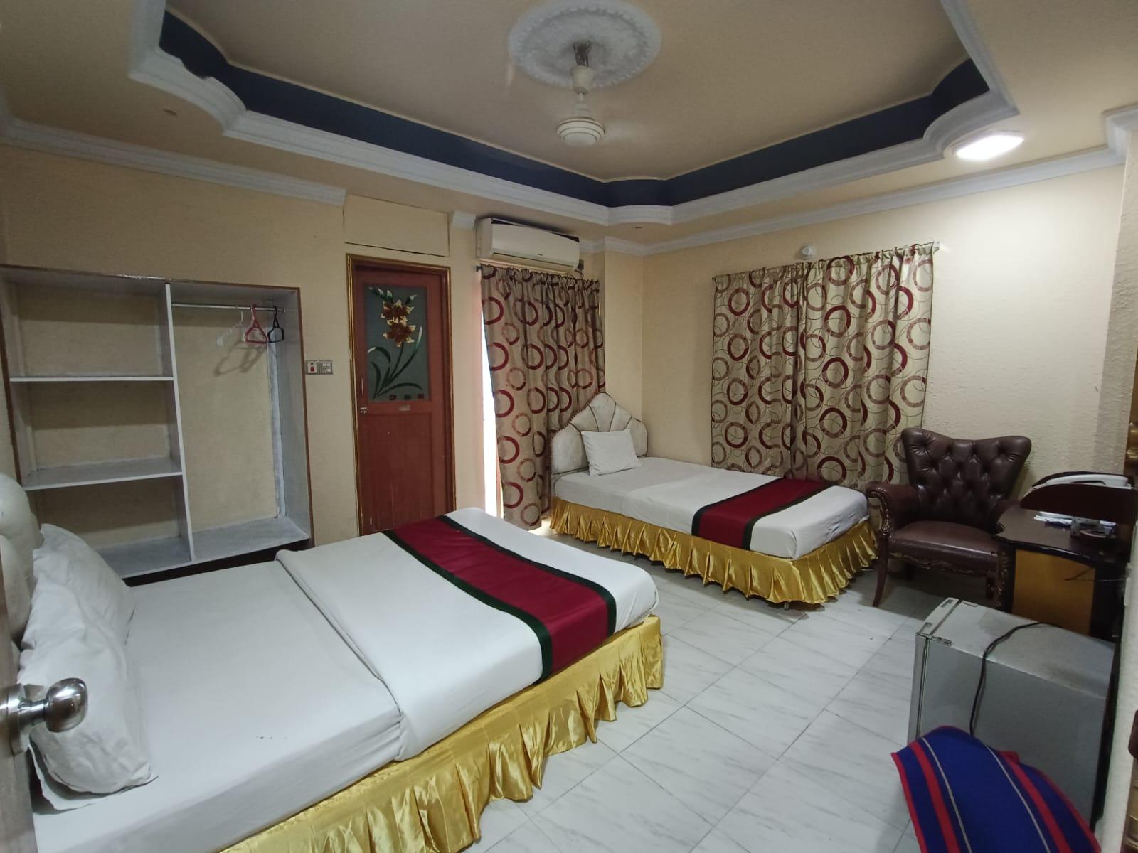 Spacious Double-Bed Room at Reyadha International, Cox’s Bazar Double-bed room with modern decor at Reyadha International Hotel near Sugandha Point, Cox’s Bazar